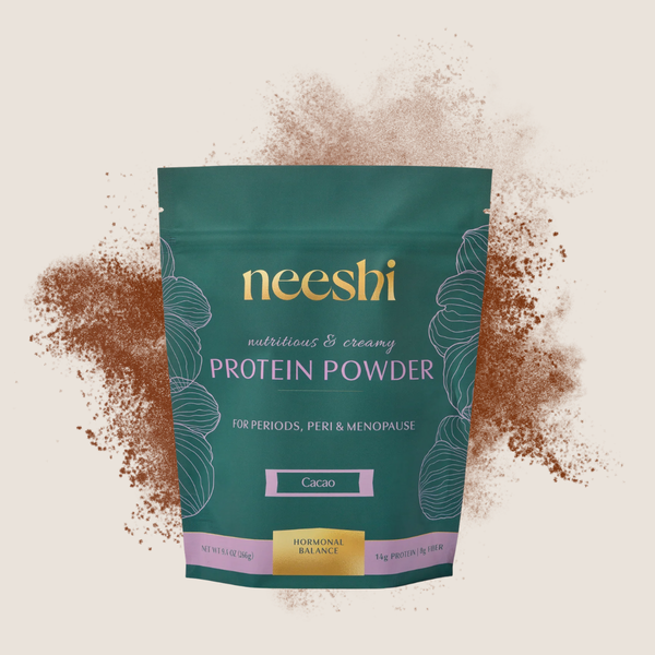 Neeshi protein powder packaging on a beige background